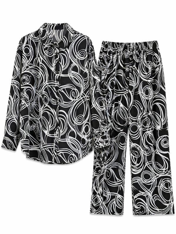 طقم حريمي (قميص + بنطلون) برسومات عصرية – ستايل شيك ومريح